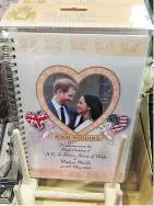  ?? — ROBIN ROBINSON ?? Shops in Windsor are chock-ablock with gewgaws marking the royal wedding.