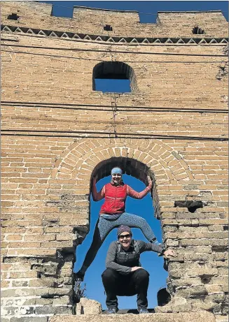  ?? Picture: SUPPLIED ?? CLIMBING THE WALL: Former East Londoner Lucille van der Merwe and her running mate, Australian Kate Goode, at the Great Wall of China where they have been training for the 100km Wild Women on the Run