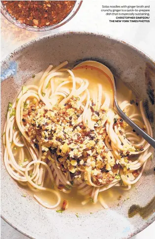  ?? CHRISTOPHE­R SIMPSON/ THE NEW YORK TIMES PHOTOS ?? Soba noodles with ginger broth and crunchy ginger is a quick-to-prepare
dish that is especially sustaining.