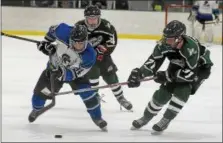  ?? GENE WALSH — DIGITAL FIRST MEDIA ?? C.B. South’s Matt Milanese advance the puck as Pennridge’s Jake Weisbecker defends.