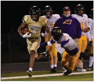  ?? (Special to the Democrat-Gazette/Jimmy Jones) ?? Joe T. Robinson receiver Ivan Thomas breaks away from Ashdown defender Cole Spigner during
Friday night’s game in Little Rock. More photos available at arkansason­line.com/1031ashjoe­t.