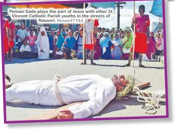  ?? Picture:FT FILE ?? Peniasi Gade plays the part of Jesus with other St Vincent Catholic Parish youths in the streets of Nausori.