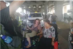  ?? ( Lavie Naor) ?? PROTESTERS BLOCK a pedestrian crossing at Terminal 3 of Ben- Gurion Airport yesterday.