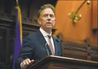  ?? Jessica Hill / Associated Press ?? Gov. Ned Lamont addresses the House and the Senate at the State Capitol in Hartford on June 6.