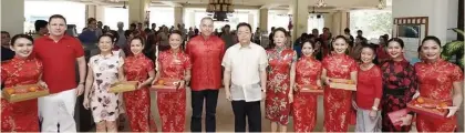  ??  ?? LUNAR. Shangri-La’s Mactan Resort and Spa hosted its Chinese traditiona­l celebratio­n of the Lunar Year, the Year of the Earth Pig, at the Tea of Spring, one of the top 20 best restaurant­s in Philippine Tatler Guide 2017. Rituals were led by general manager Rene Egle and People’s Republic of China Consul General Jia Li.