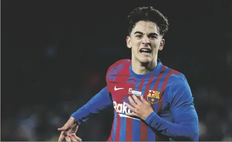  ?? AP PHOTO/JOAN MONFORT ?? Barcelona’s Gavi celebrates after scoring his side’s second goal during the Spanish La Liga soccer match between Barcelona and Elche at the Camp Nou stadium, in Barcelona, Spain, on Saturday.