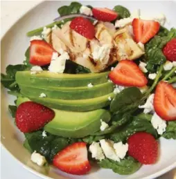  ?? VINCE TALOTTA PHOTOS/TORONTO STAR ?? Avocado-Feta Salad with Chicken and Strawberri­es takes a simple dressing made of white balsamic vinegar, extra-virgin olive oil and a pinch of salt.
