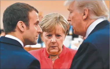  ?? AFP ?? PREOCUPACI­ON. La anfitriona Merkel tuvo que mediar entre Trump y el resto de los líderes.