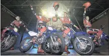  ??  ?? DAREDEVILS: It’s all about taking risks for the daredevils in the Globe of Death motorcycle act. All the riders put in hours of practice ahead of going on tour