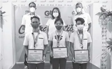  ??  ?? IN photo (front, from left) are James Edoloverio, Kaye Nicole Bacalso, and Kent John Caburnay, who have been a part of GBP’S scholarshi­p program since Grade One, with GBP officers in Cebu.