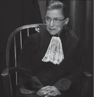  ?? ROGER L. WOLLENBERG/ABACA PRESS FILE PHOTOGRAPH ?? Ruth Bader Ginsberg sits with fellow Supreme Court Justices of the United States for a formal group photo in 2010. Ginsburg broke three ribs in a fall Wednesday at her office and is recovering in the hospital.