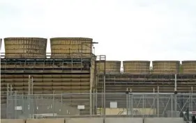  ?? EVAN FROST/MINNESOTA PUBLIC RADIO VIA AP ?? Cooling towers release heat generated by boiling water reactors at Xcel Energy’s Nuclear Generating Plant in 2019 in Monticello, Minn.