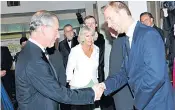  ??  ?? Alex King is introduced to Prince Charles and the Duchess of Cornwall after gatecrashi­ng the 2006 premiere of The History Boys