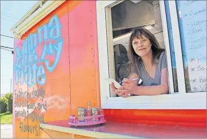  ?? AMANDA JESS ?? Deborah Tupper is ready to take your order. The Wanna Lick My Plate Food Truck owner can be spotted on weekdays in New Glasgow and Blue Acres and at the New Glasgow Farmers Market on Saturdays.