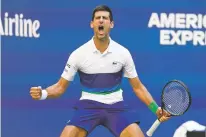  ?? JOHN MINCHILLO/ASSOCIATED PRESS ?? Novak Djokovic of Serbia reacts after scoring a point against Kei Nishikori of Japan during the third round of the U.S. Open on Saturday in New York.