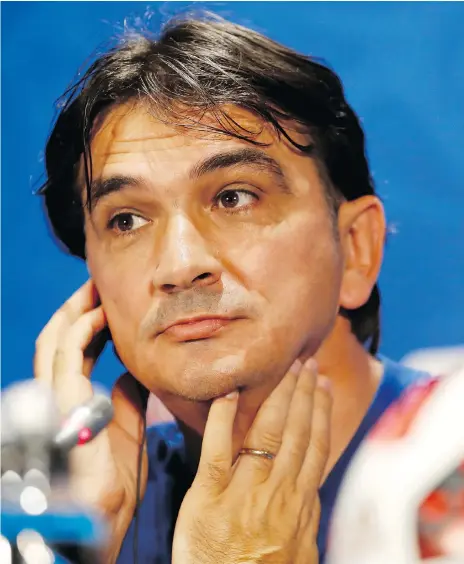 ?? THE ASSOCIATED PRESS ?? Croatia head coach Zlatko Dalic takes a question during a news conference on Thursday in Moscow. With his team having played 90 minutes of extra time en route to the World Cup final, Dalic may face more questions about why he sent his star striker...