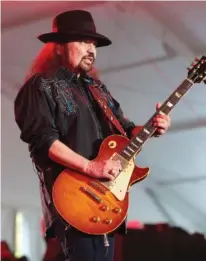  ?? PHOTO BY OWEN SWEENEY/INVISION/AP ?? Gary Rossington of the band Lynyrd Skynyrd performs on Day 1 of the 2015 Big Barrel Country Music Festival at The Woodlands in Dover, Del.