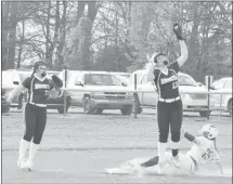  ?? Fred Conley • Times-Herald ?? Palestiine-Wheatley’s Rhealee McGraw slides into second base during Monday's home opening game against Hazen. The Lady Patriots won the game 3-1.