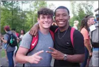  ?? (Courtesy of Arkansas FCA) ?? Two participan­ts take a buddy photo at a previous Arkansas Fellowship of Christian Athletes camp in Lonsdale. The camp was missed in 2020, says FCA official Micah May.
