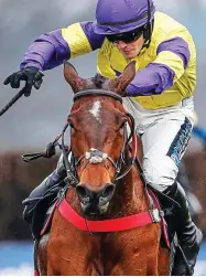  ?? GETTY IMAGES ?? Purple patch: Richard Patrick guides Happy Diva to victory at Ascot last year