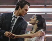  ?? NIKO TAVERNISE/20TH CENTURY FOX ?? Ansel Elgort as Tony and Rachel Zegler as Maria are the star-crossed lovers in Steven Spielberg’s remake/revival of “West Side Story.”