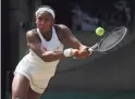  ?? KIRSTY WIGGLESWOR­TH/AP ?? Coco Gauff hits a return to Simona Halep during their Wimbledon match on Monday in London. Halep won 6-3, 6-3.
