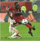  ??  ?? No penalty...Sadio Mane is brought down by Rafinha