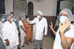  ??  ?? NURSING STAFF of Patna Medical College and Hospital stage a protest in front of Bihar Health Minister Mangal Pandey demanding overtime salary, in Patna on July 24.