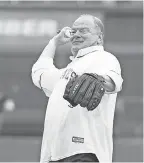  ??  ?? Chip Ganassi, throwing out the first pitch at the Pirates’ season opener, hails from Pittsburgh and runs his motor sports teams from the Steel City. CHARLES LECLAIRE/USA TODAY SPORTS