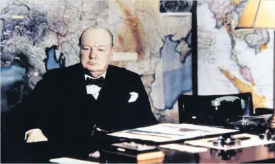  ??  ?? Winston Churchill at his desk in the No 10 Annexe Map Room, May 1945, in the Cabinet war rooms