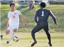  ?? STAFF FILE PHOTO BY MATT HAMILTON ?? Yahir Paez, left, scored Dalton’s goal in Friday’s 3-1 loss to Lassiter in the GHSA Class AAAAAA boys’ soccer state final Friday night in Macon, Ga.