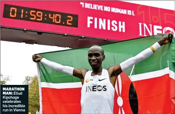  ??  ?? MARATHON
MAN: Eliud Kipchoge celebrates his incredible run in Vienna