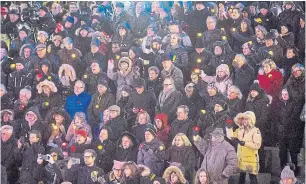  ?? TIJANA MARTIN THE CANADIAN PRESS ?? Toronto residents came out to Mel Lastman Square for a vigil honouring the victims of the shooting at a Pittsburgh synagogue. "Hatred will never tear us down,” said UJA Federation president and CEO Adam Minsky. It was one of several vigils across the country on Monday.