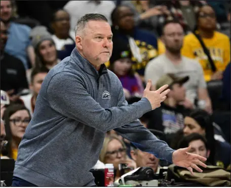  ?? ANDY CROSS — THE DENVER POST ?? Nuggets head coach Michael Malone directs traffic from the sideline in the second half against the Portland Trail Blazers at Ball Arena on Feb. 2.