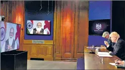  ?? ANDREW PARSONS/NO10 DOWNING STREET ?? PM Narendra Modi holds a virtual meeting with UK PM Boris Johnson after the latter cancelled a visit to New Delhi twice because of the Covid-19 situation.