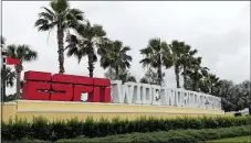  ?? JOHN RAOUX — THE ASSOCIATED PRESS ?? A sign marking the entrance to ESPN’s Wide World of Sports at Walt Disney World is seen Wednesday in Kissimmee, Fla. The NBA has told the NBA Players Associatio­n that it will present a 22-team plan for restarting the season at Disney.