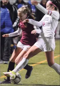  ?? Dave Phillips / For Hearst Connecticu­t Media ?? Sara Parker of St. Joseph fights for the ball with Nicole Li of Waterford during the CIAC Class L girls’ soccer semifinals Tuesday night at Strong Stadium in West Haven.