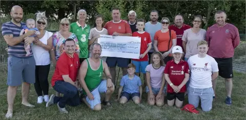  ??  ?? The O’Connor family presenting a cheque for €1,100 to New Ross Celtic Football Club, proceeds from the recent Anthony ‘Drac’ O’Connor Memorial soccer tournament. It was accepted by Brad O’Neill and members of New Ross Celtic.