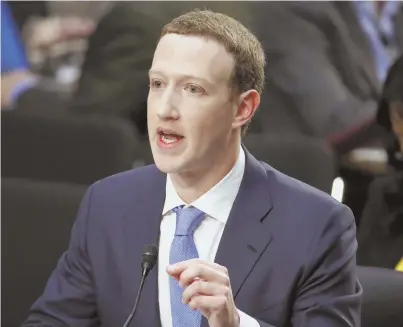  ?? AP PHOTOS ?? ON THE HOT SEAT: Facebook CEO Mark Zuckerberg testifies at a congressio­nal hearing yesterday about the popular social media platform’s recent data privacy breaches. Protesters on hand, above left, make their feelings known.