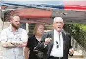  ?? Jerry Larson / Waco Tribune Herald ?? Attorney Paul Looney speaks for Cody Ledbetter, left, a biker arrested in the Twin Peaks shooting, in May 2016 at the McLennan County Courthouse.