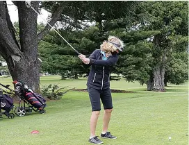  ??  ?? Right - Judy Wilkinson tees off to start the next hole of her competitio­n round, the ball finding the middle of the fairway.