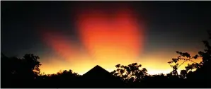  ?? STEPHEN JAMES O’MEARA STEPHEN JAMES O’MEARA ?? ABOVE: Glowing volcanic aerosols and crepuscula­r rays formed this display Feb. 8, 2022, over Maun, Botswana.
TOP RIGHT: Jupiter shines through volcanic twilight clouds Jan. 23 (top). The sky evokes Edvard Munch’s The
Scream (bottom), which has been linked to volcanic twilights from 1883’s Krakatau eruption. STEPHEN JAMES O’MEARA; NATIONAL GALLERY OF NORWAY
BOTTOM RIGHT: Bishop’s Ring as seen shortly before night Feb. 8, centered on a near First Quarter Moon. A volcanic glow lingers in the west.