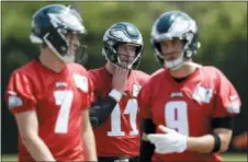  ?? MATT SLOCUM — THE ASSOCIATED PRESS ?? With Nate Sudfeld, left, Carson Wentz, center, and Super Bowl MVP Nick Foles, right, all back, quarterbac­k is one of the Eagle’s strongest positions heading into next week’s minicamp, Bob Grotz says.