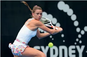  ??  ?? Italy’s Camila Giorgi defeated Australian Ajla Tomljanovi­c 6-3, 6-3 in the Sydney Internatio­nal tennis tournament’s first round on Monday. —