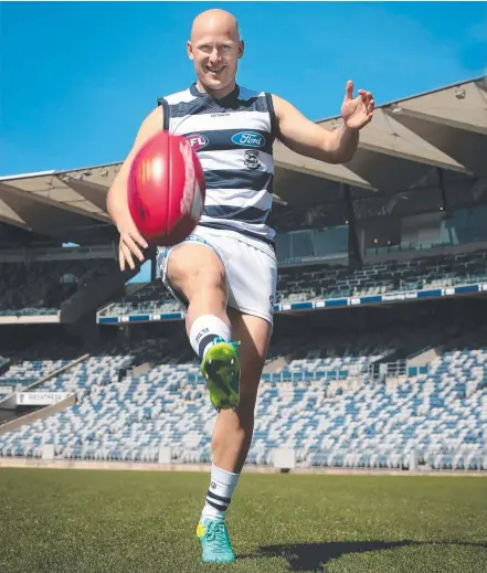  ?? Picture: ALISON WYND ?? It’s a tough image for Suns fans to deal with but Gary Ablett is back in the blue and white hoops at Geelong.