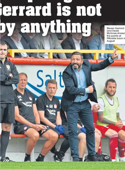  ??  ?? Steven Gerrard and Derek Mcinnes shared the points at Pittodrie back in August