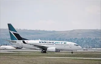  ?? JEFF MCINTOSH THE CANADIAN PRESS ?? WestJet Airlines says contract negotiatio­ns with its pilots resumed Monday in Calgary, but gave no details.