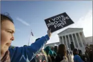  ?? JOSE LUIS MAGANA - THE ASSOCIATED PRESS ?? Anti-abortion demonstrat­ors rally outside of the U.S. Supreme Court in Washington, Wednesday, March 4. The Supreme Court is taking up the first major abortion case of the Trump era Wednesday, an election-year look at a Louisiana dispute that could reveal how willing the more conservati­ve court is to roll back abortion rights.