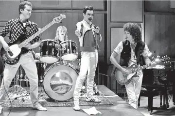  ??  ?? (L-r) Joe Mazzello (John Deacon), Ben Hardy (Roger Taylor), Rami Malek (Freddie Mercury) and Gwilym Lee (Brian May) in “Bohemian Rhapsody.”MUST CREDIT:Alex Bailey,Twentieth Century Fox