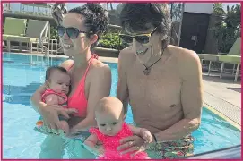  ??  ?? The Rolling Stones singer, right, with Jerry Hall and their daughter Elizabeth. Left, Ronnie Wood and his wife Sally show off their twins earlier this year